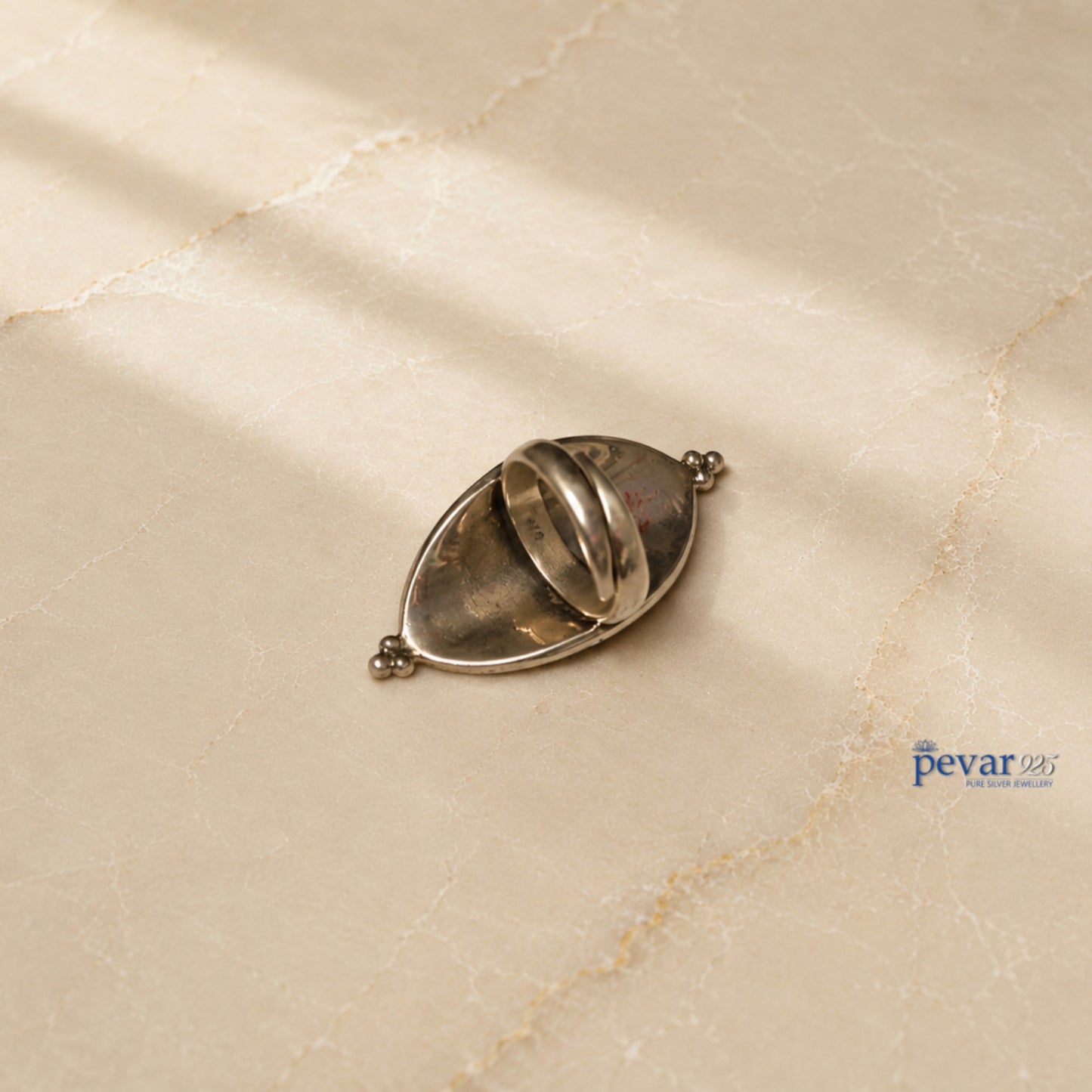 pevar925 handcrafted 925 oxidized silver adjustable ring with floral meenakari enamel and beaded border on marble surface