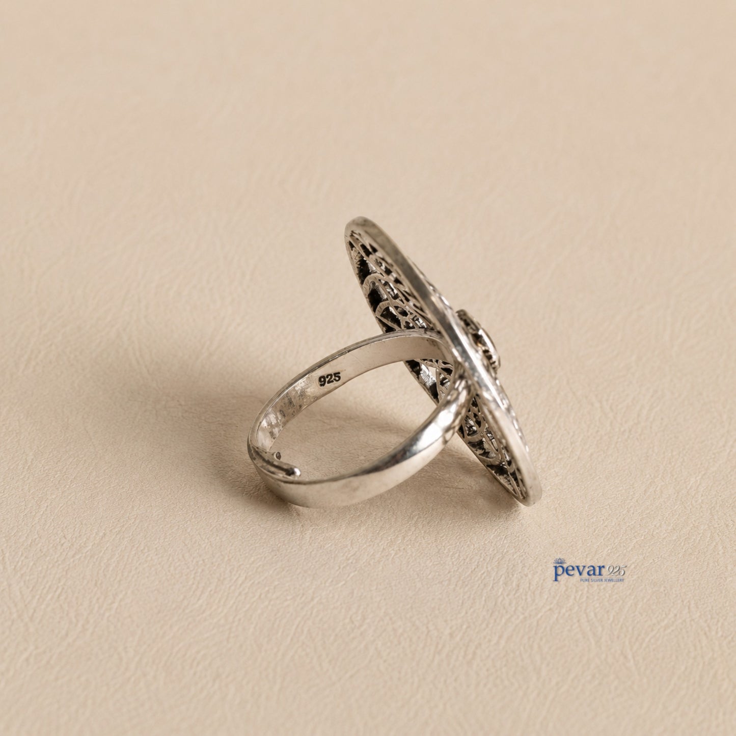 pevar925 oxidized sterling silver adjustable ring with intricate circular floral filigree and a central red stone