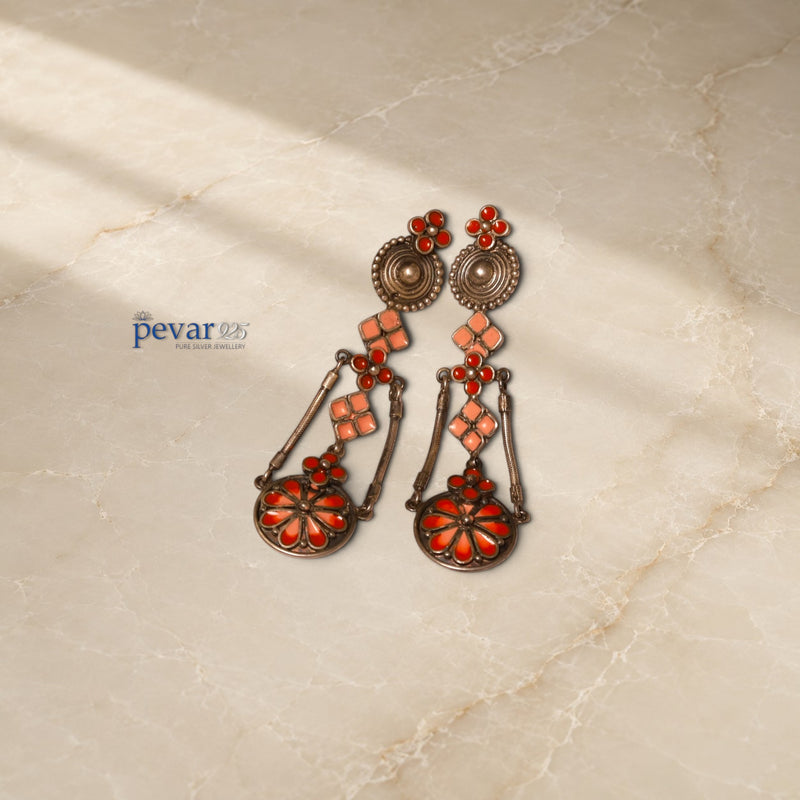 pevar925 Chandrika handcrafted oxidized silver earrings with red floral minakari enamel and ornate geometric motifs.
