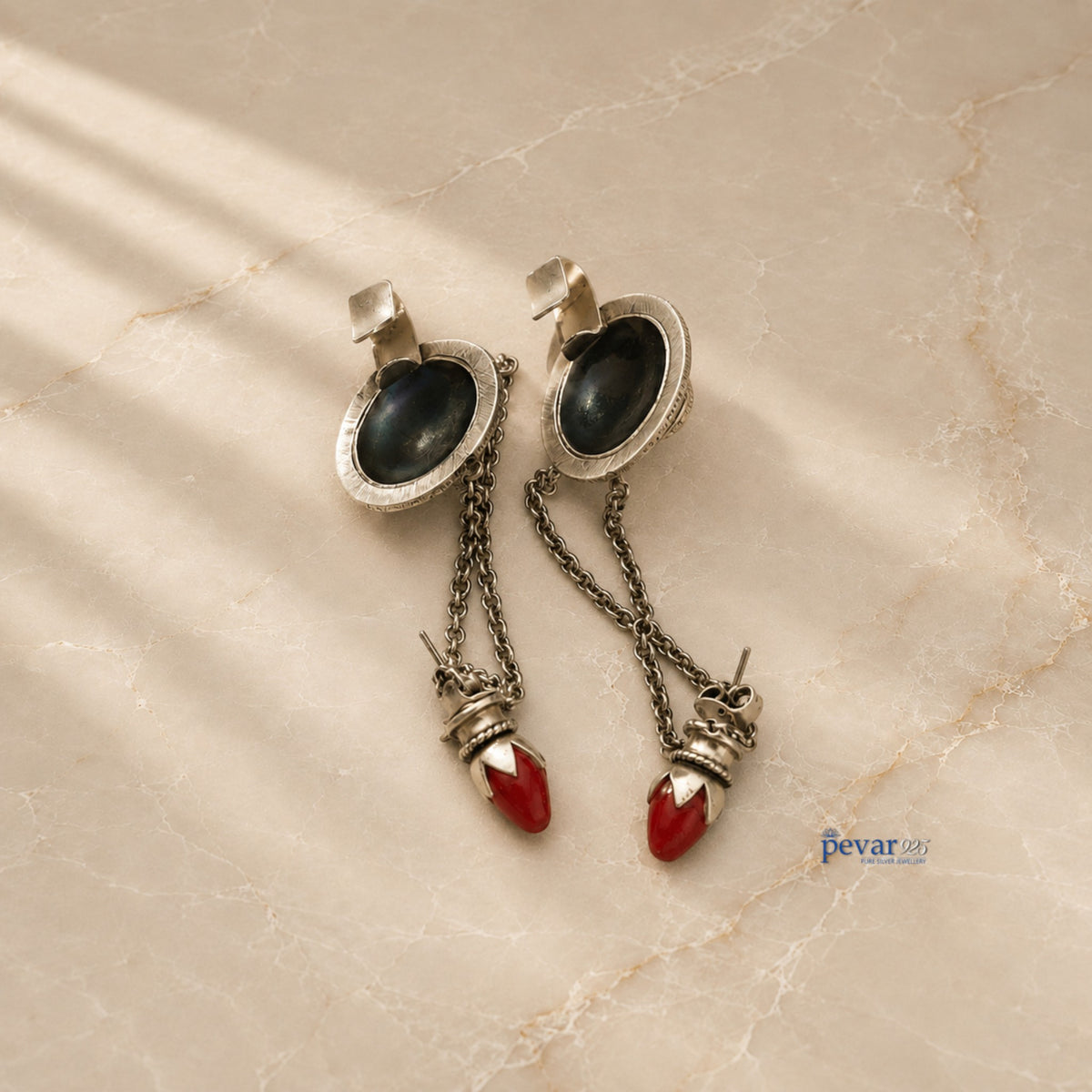 pevar925 oxidized 925 silver tribal earrings with black stone inlay, dangling chains, and red bead accents.