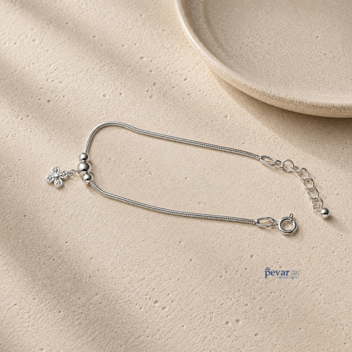 pevar925 sterling silver floral charm bracelet with clear gemstones on a delicate chain and adjustable lobster clasp