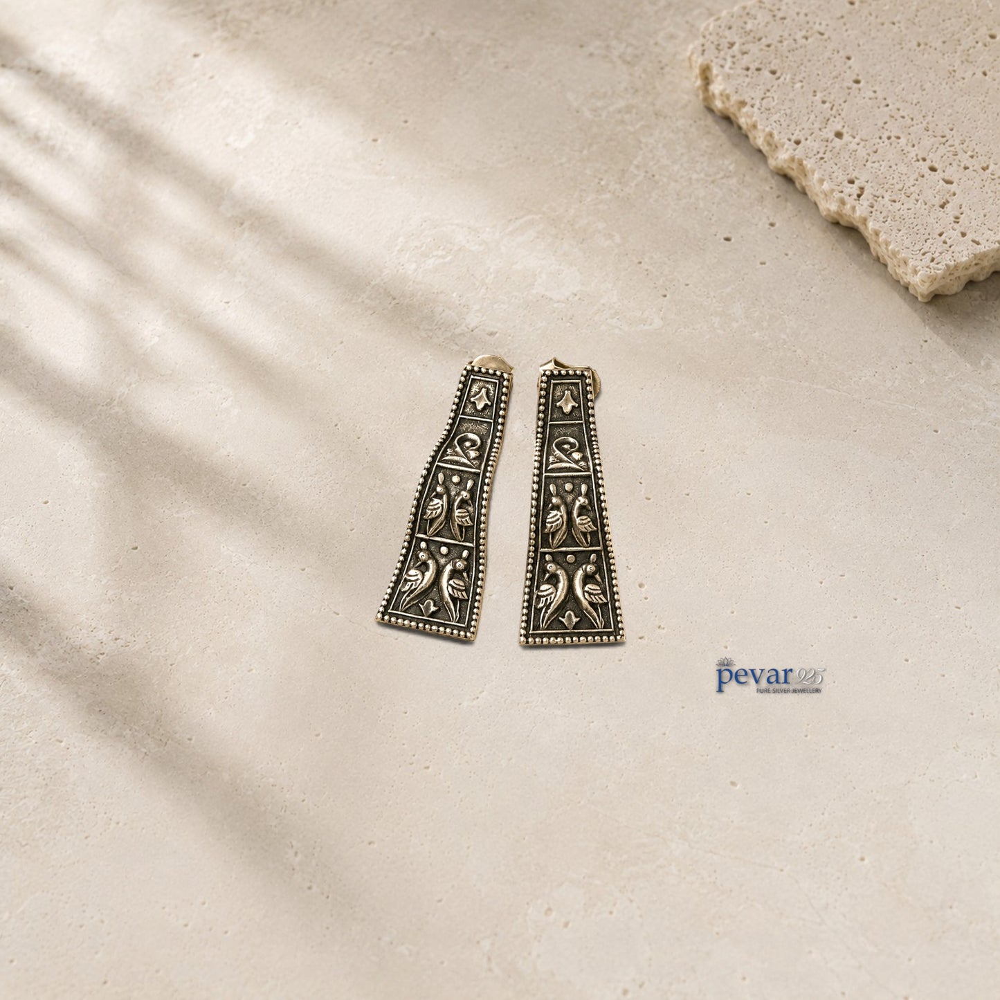 pevar925 oxidized 925 silver angled earrings featuring intricate bird motifs and a vintage antique finish.