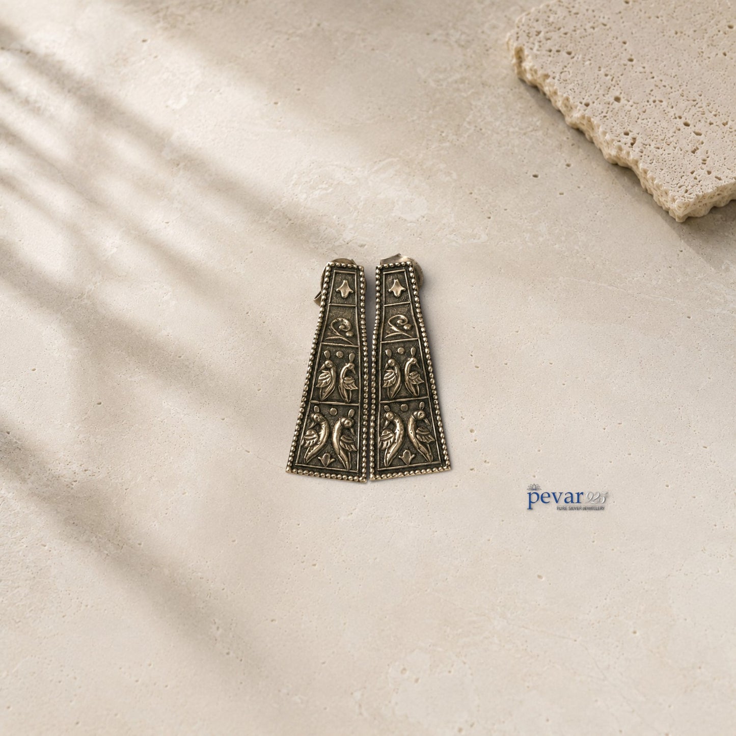 pevar925 oxidized 925 silver angled earrings featuring intricate bird motifs and vintage antique finish