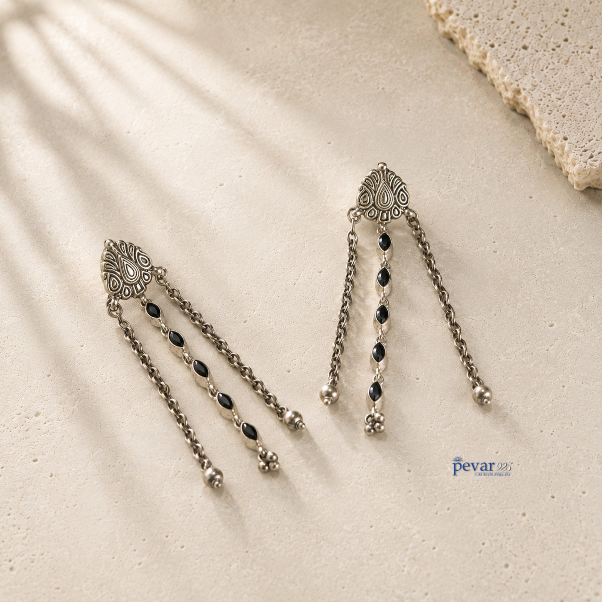 pevar925 oxidized 925 sterling silver dangle earrings with black oval stones, floral clusters, and intricate carvings.