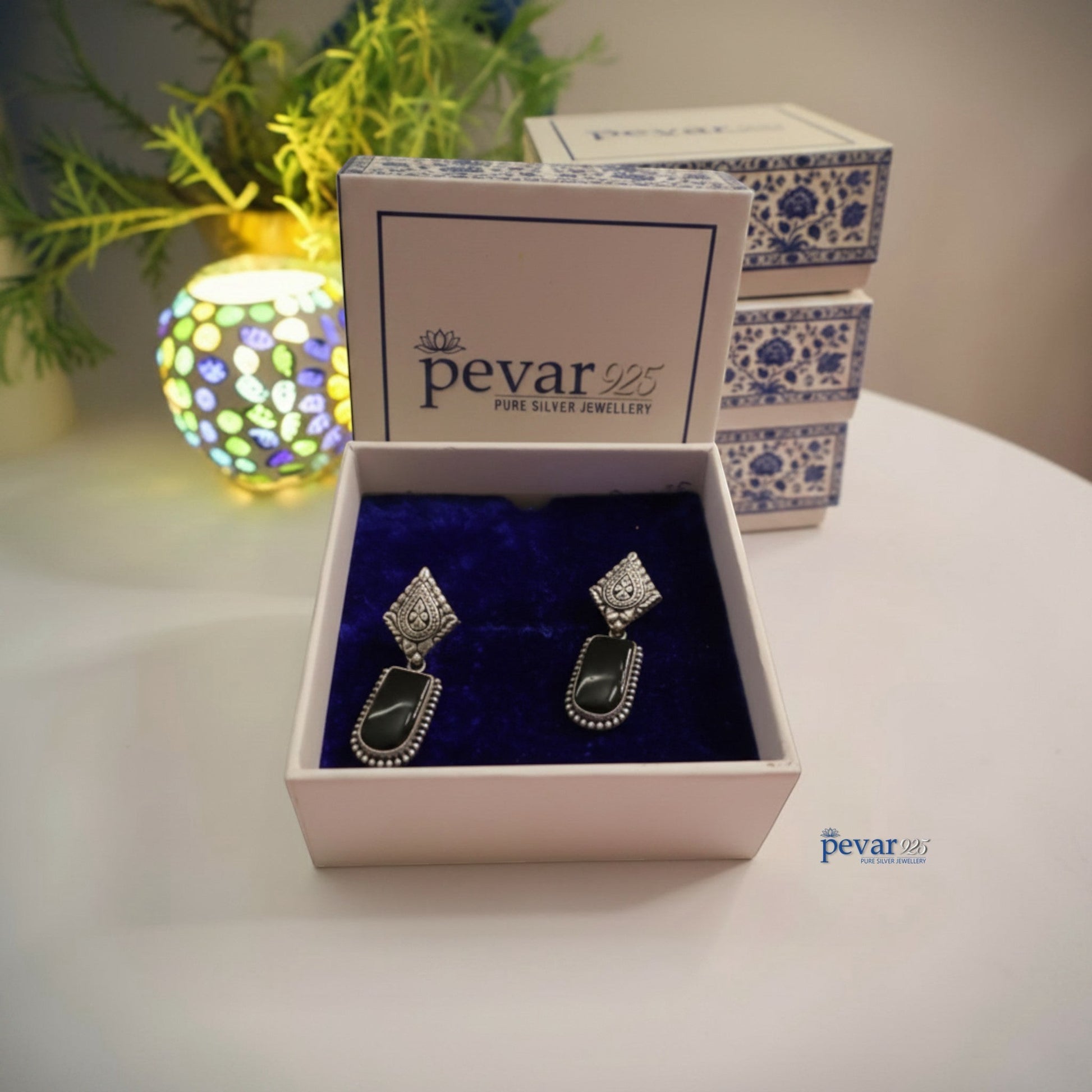 pevar925 oxidized 925 sterling silver drop earrings with black stones in an elegant branded jewellery box