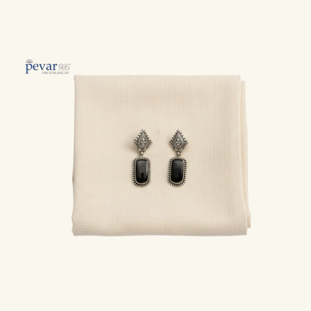 pevar925 oxidized 925 sterling silver drop earrings featuring rectangular black stones and ornate antique detailing.