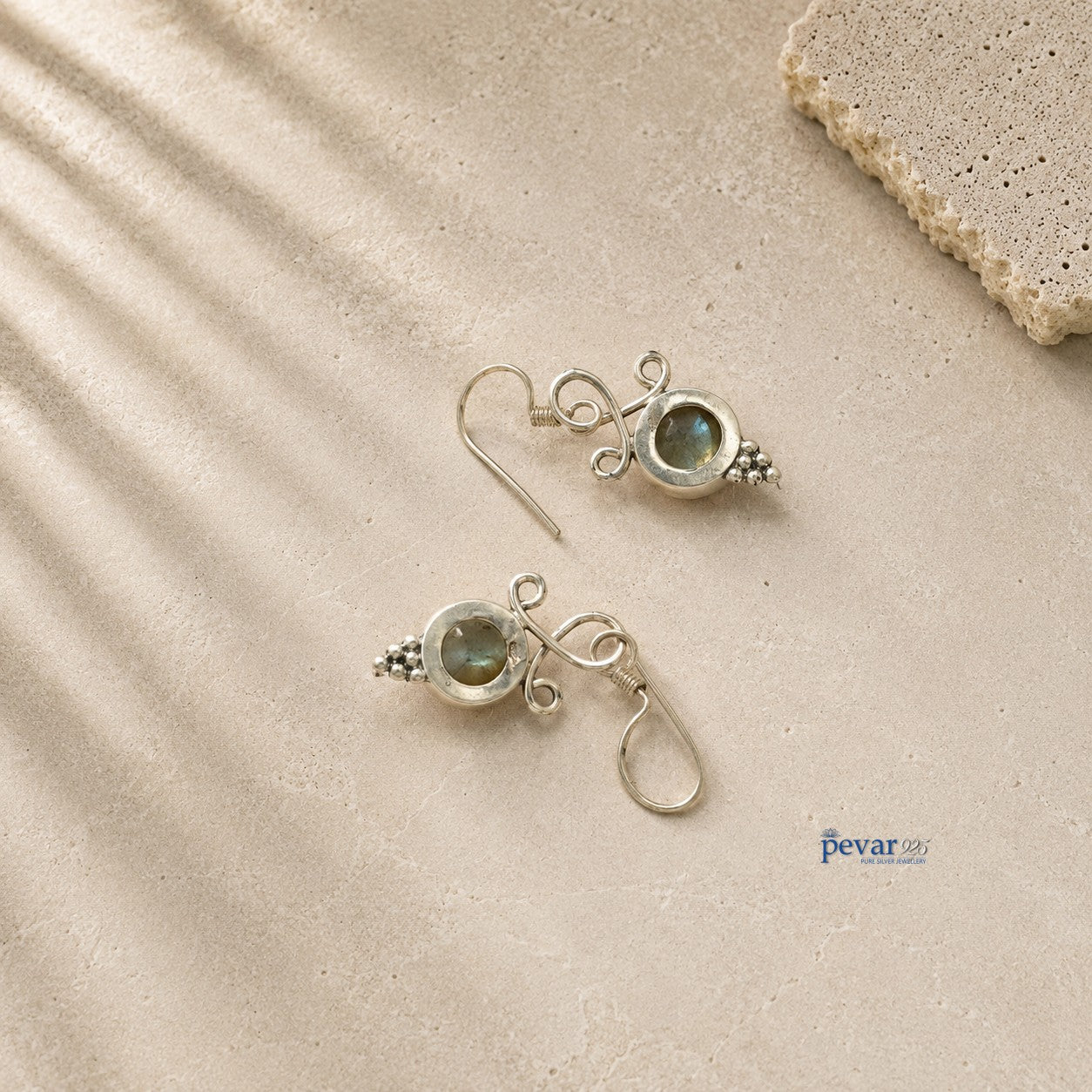 pevar925 oxidized 925 silver hook earrings featuring round blue crom stones with intricate antique metalwork