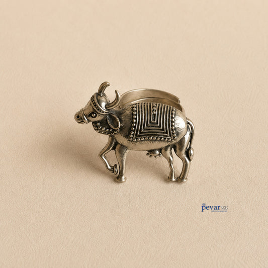 pevar925 oxidized sterling silver adjustable ring featuring a detailed sculptural cow motif with antique engravings.