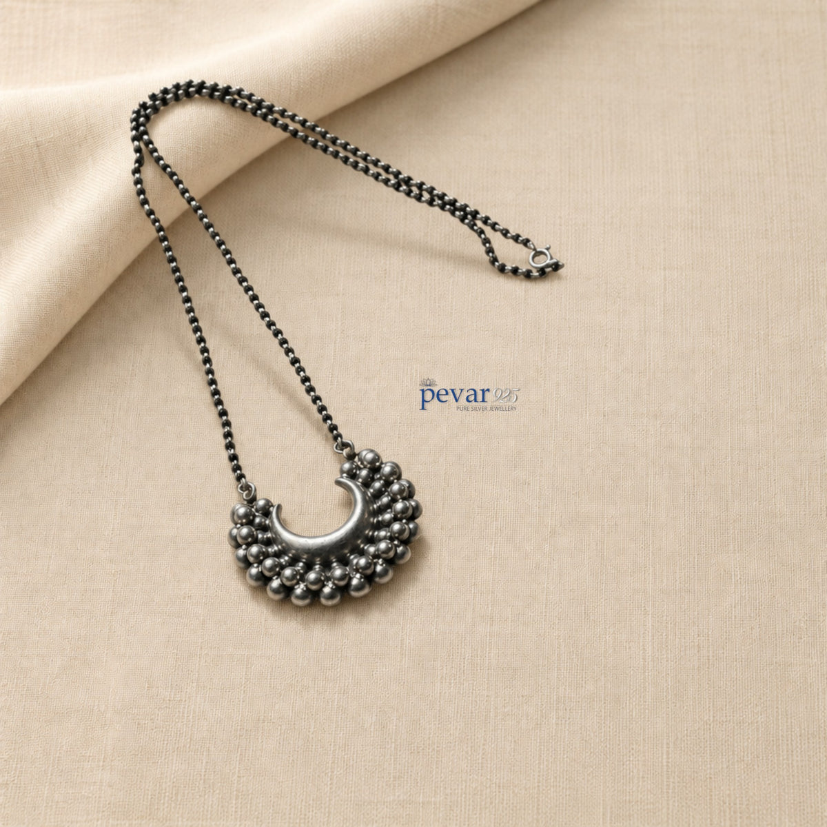 pevar925 oxidized 925 sterling silver mangalsutra with black beads and a crescent-shaped beaded pendant