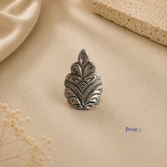 pevar925 oxidized silver crown-shaped ring with intricate chitai engraving on a beige textured background
