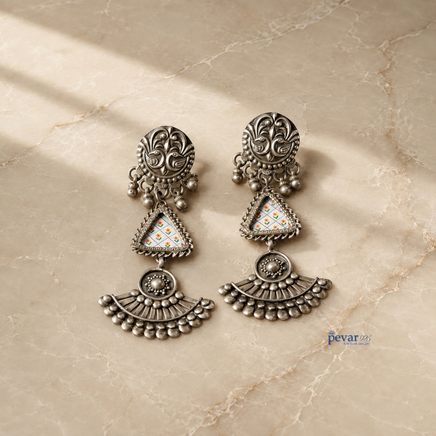 pevar925 oxidized 925 silver drop earrings featuring hand-painted floral motifs and traditional ethnic design.