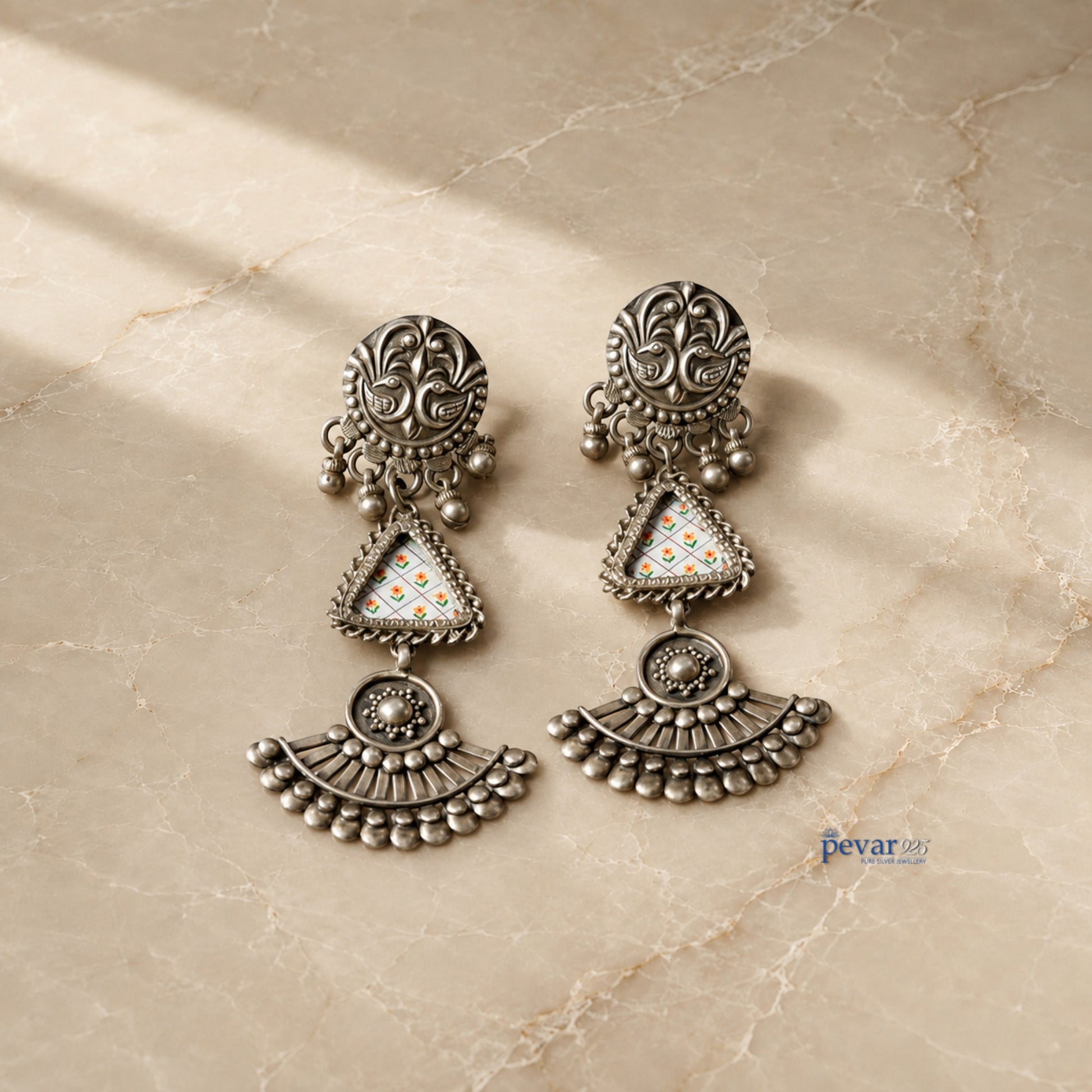 pevar925 oxidized 925 silver drop earrings featuring hand-painted floral motifs and traditional ethnic design.