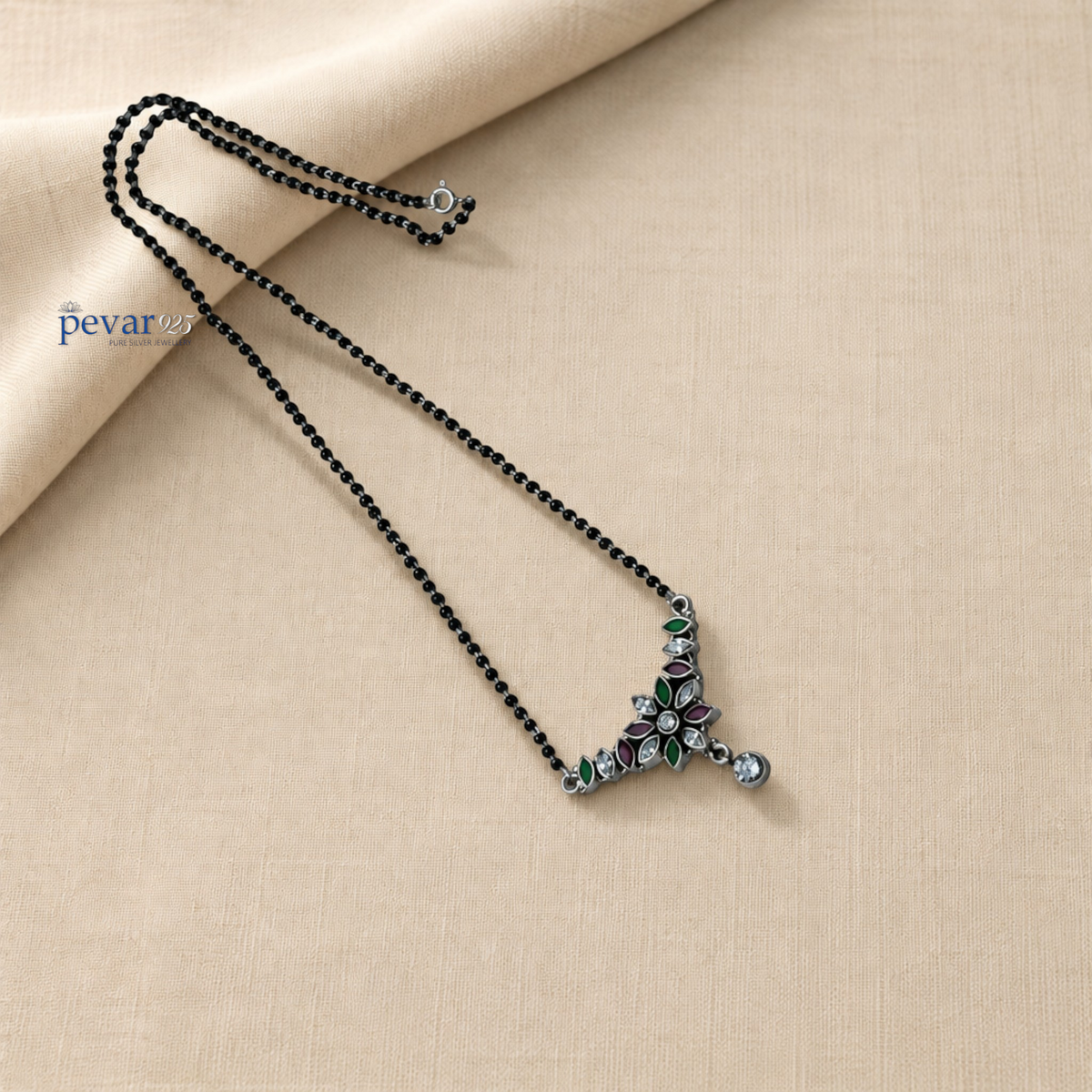 pevar925 oxidized sterling silver mangalsutra with black beads and a floral pendant featuring maroon and green stones