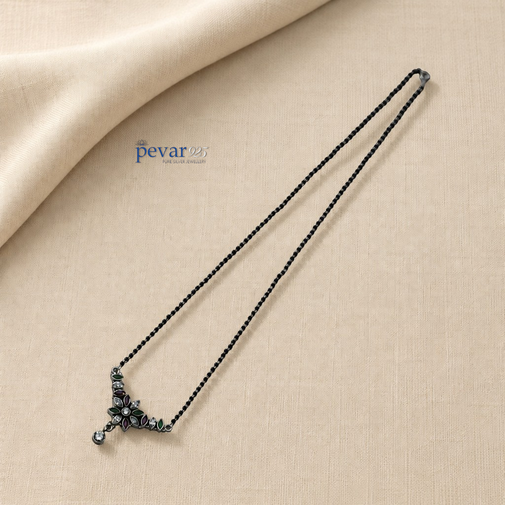 pevar925 oxidized sterling silver mangalsutra with black beads and a floral pendant featuring maroon and green stones