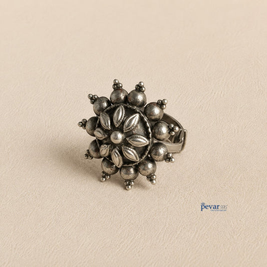 pevar925 oxidized sterling silver adjustable ring featuring an antique circular floral motif with petal engravings