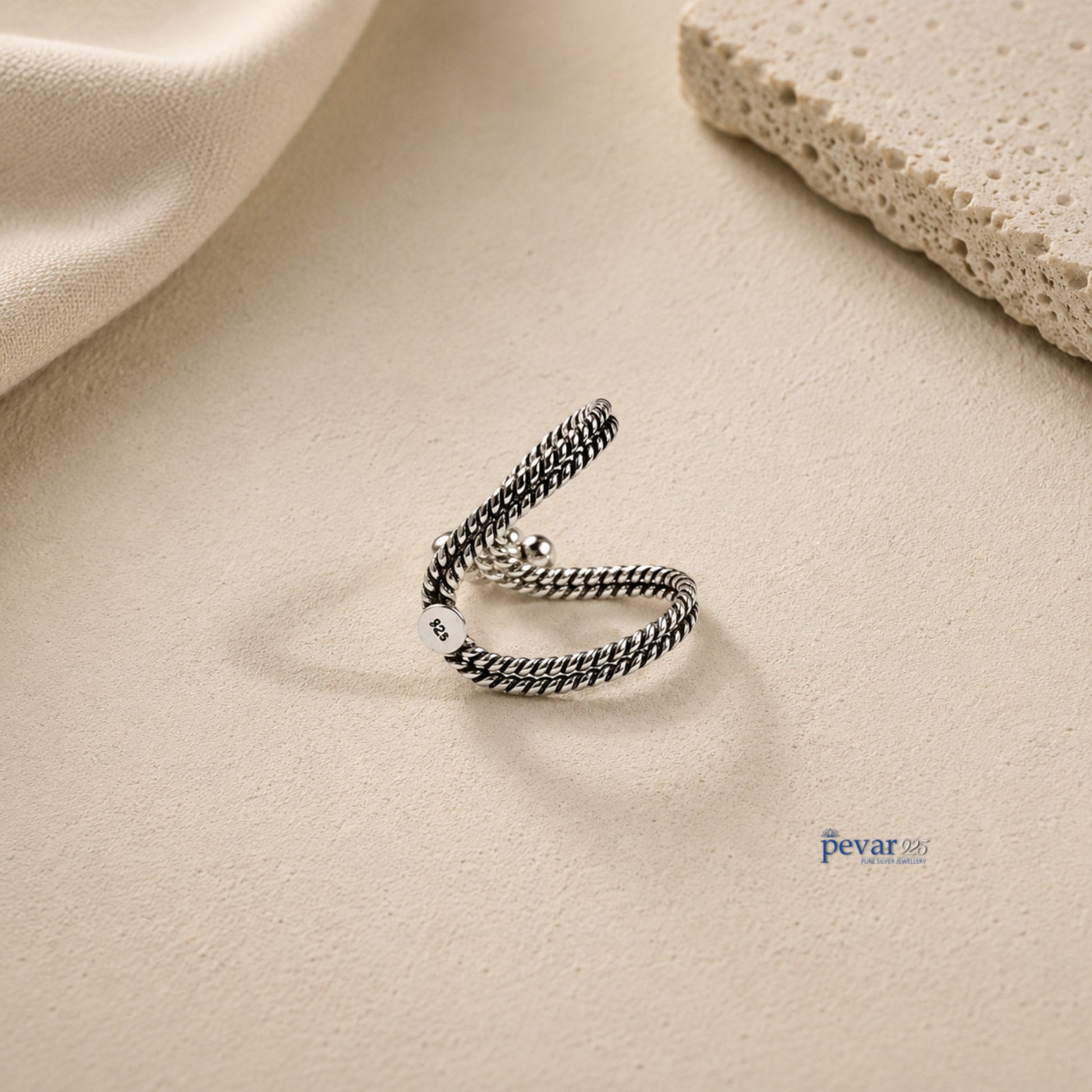 pevar925 oxidized sterling silver V-shaped ring with traditional ghunghroo beads and a twisted rope band design