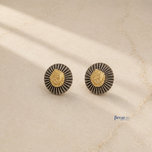 pevar925 oxidized silver temple earrings with a golden goddess face motif and radiating circular frame design.