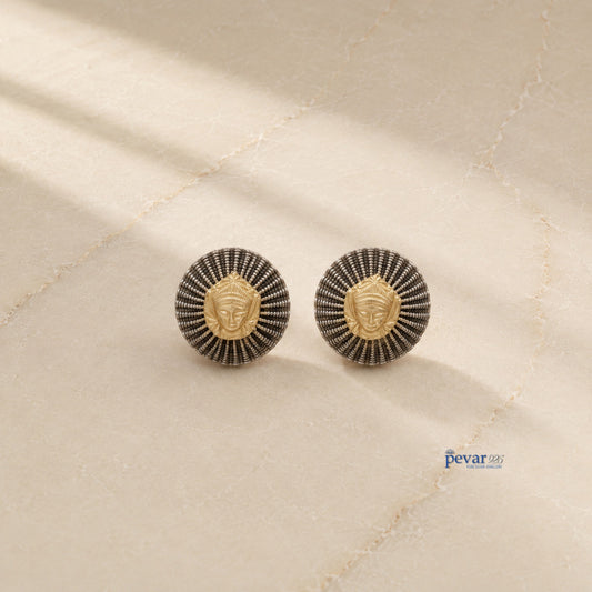 pevar925 oxidized silver round earrings featuring a central golden goddess motif and textured radiating ridges