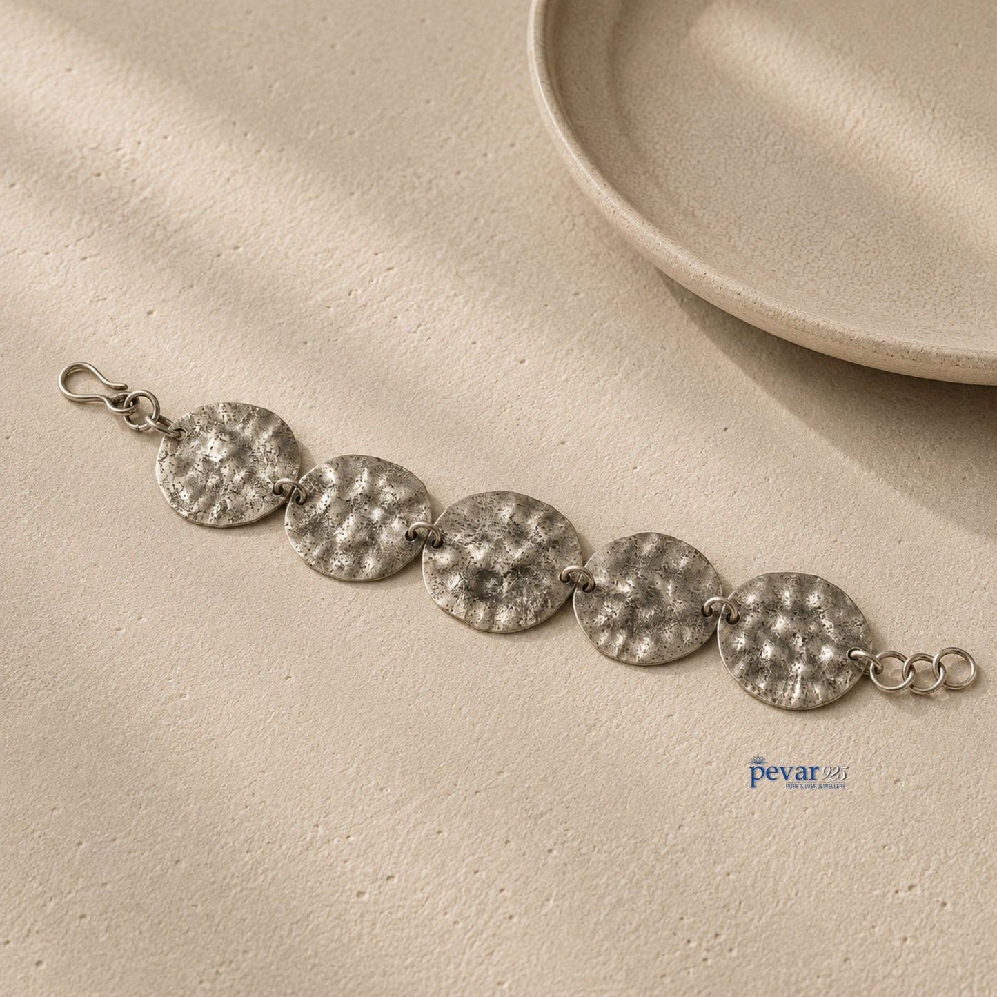 pevar925 oxidized sterling silver bracelet featuring five rustic hammered discs on a fine chain with a hook clasp