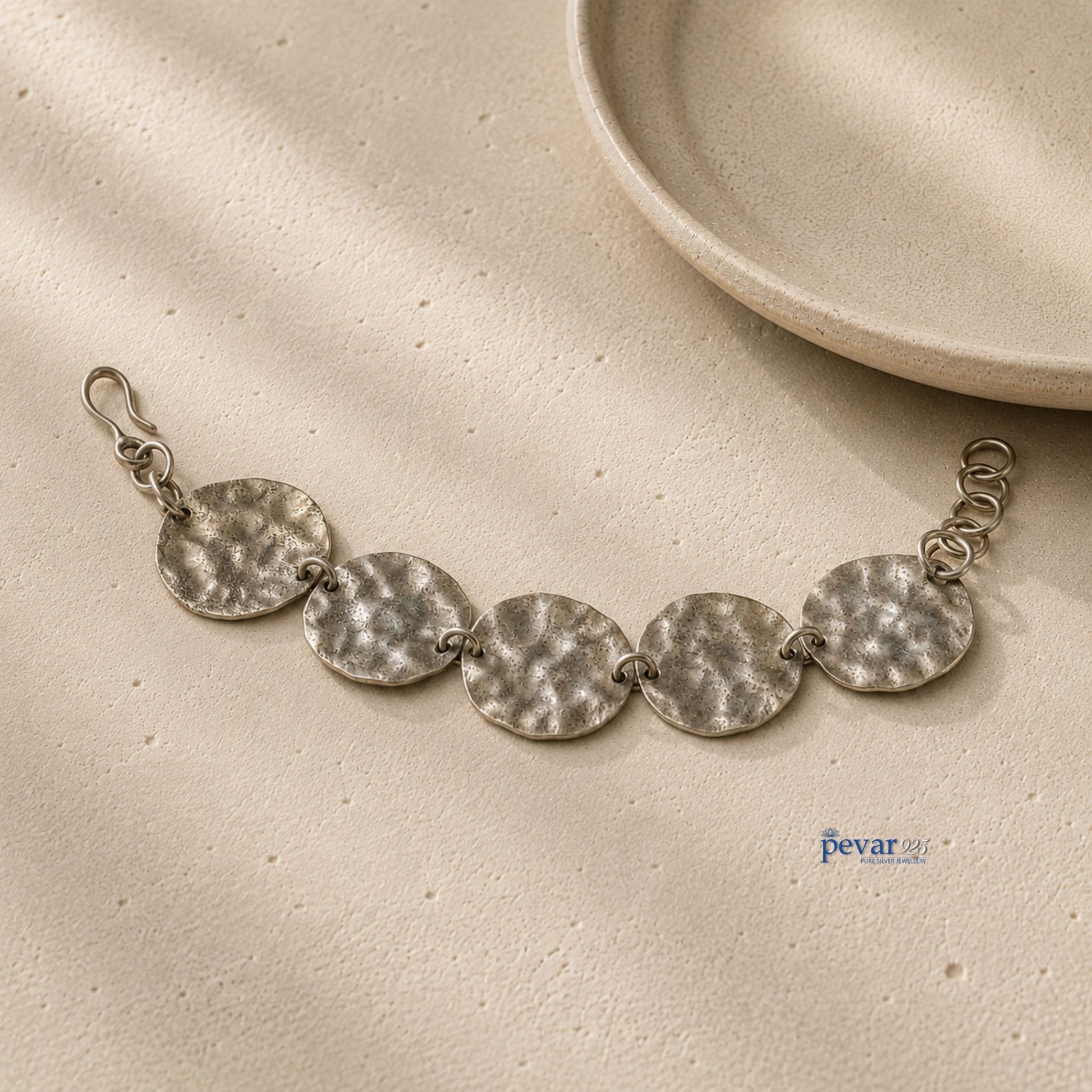 pevar925 oxidized sterling silver bracelet featuring five textured hammered discs on a fine chain with a hook clasp