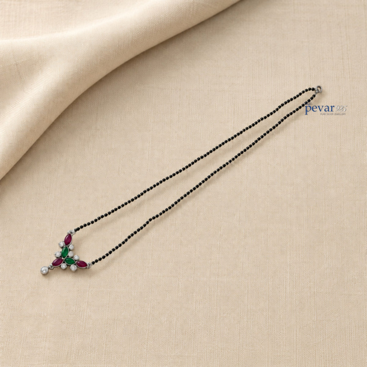 pevar925 oxidized sterling silver mangalsutra with black beads and a maroon and green leaf motif stone pendant