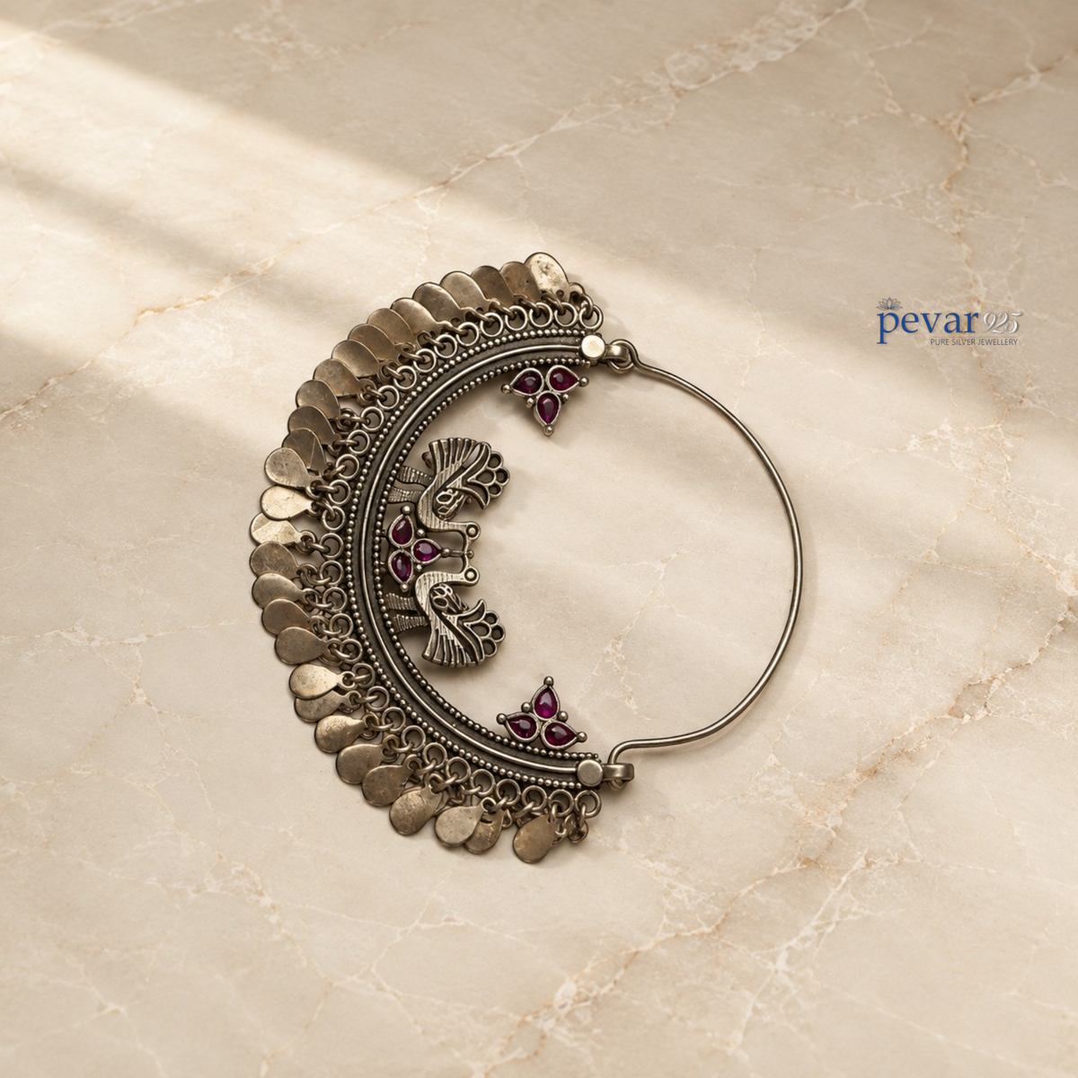 pevar925 oxidized sterling silver Mayuri Chandbali earring with magenta stone accents and intricate peacock motifs.