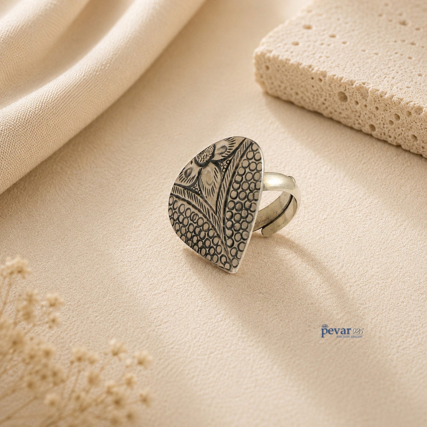 pevar925 oxidized silver adjustable ring featuring a handcrafted paan leaf motif with intricate chitai engraving.