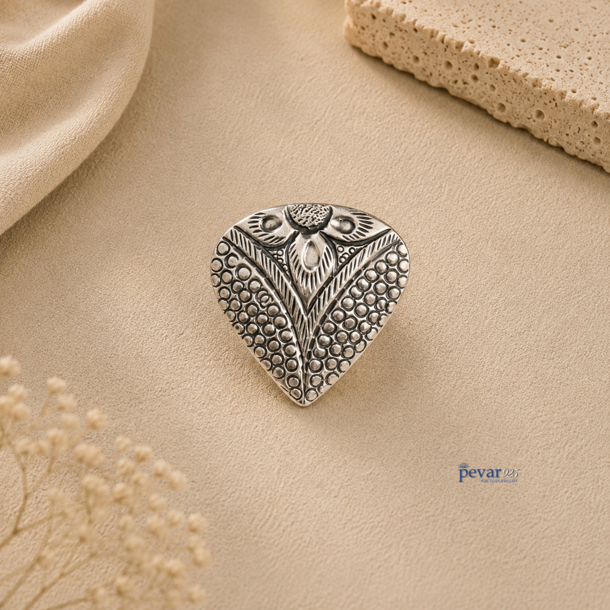 pevar925 oxidized silver adjustable ring featuring an intricate paan leaf motif with traditional chitai engraving.