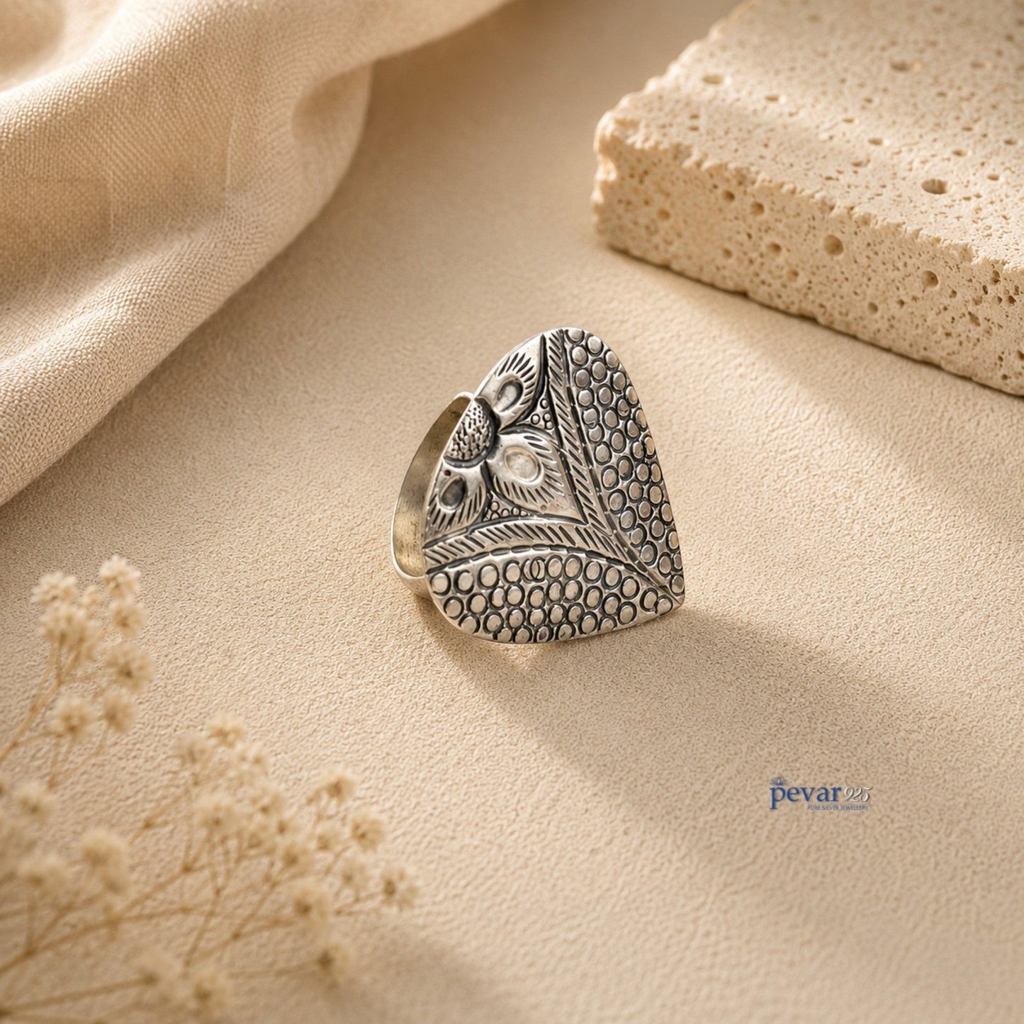 pevar925 oxidized silver adjustable ring featuring a handcrafted paan leaf motif with intricate chitai engraving.