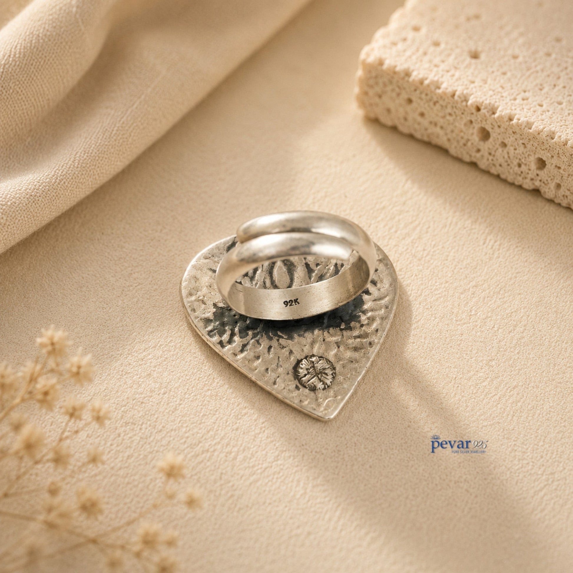 pevar925 oxidized silver adjustable ring featuring a handcrafted paan leaf motif with intricate chitai engraving.