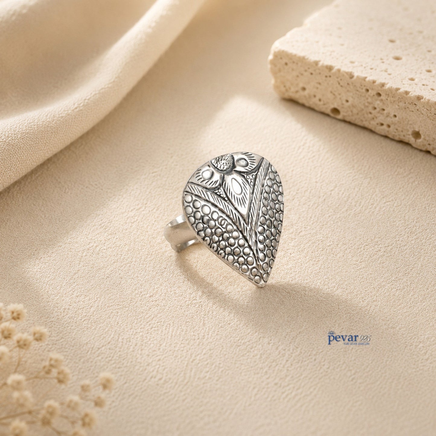 pevar925 oxidized silver adjustable ring featuring a handcrafted paan leaf motif with intricate chitai engraving.