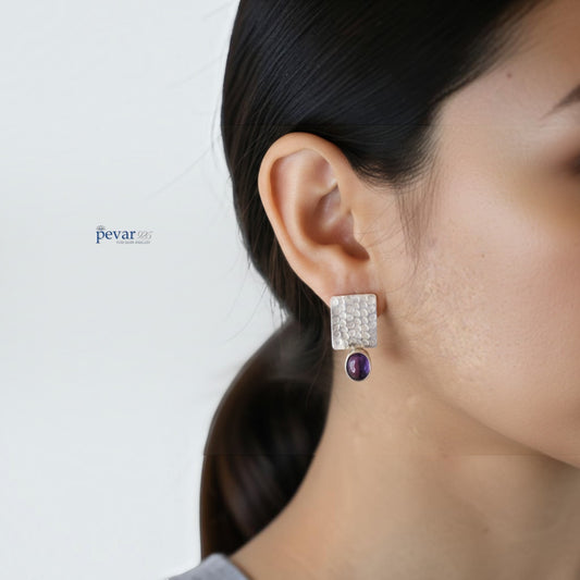 pevar925 oxidized 925 silver rectangular earrings featuring a textured finish and a vibrant purple stone drop