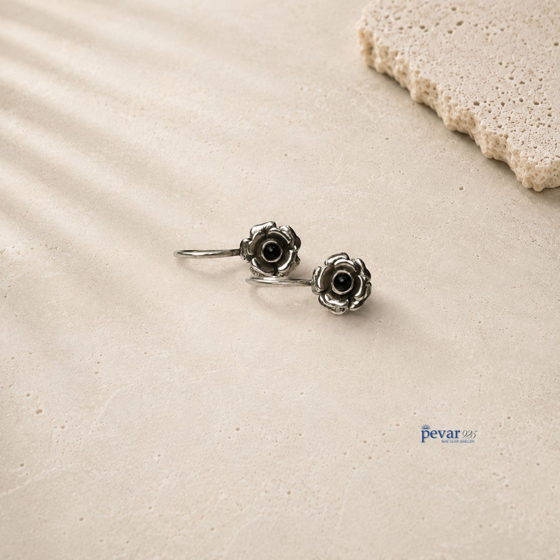 pevar925 oxidized 925 silver drop earrings featuring delicate rose flower motifs with black stone centers.
