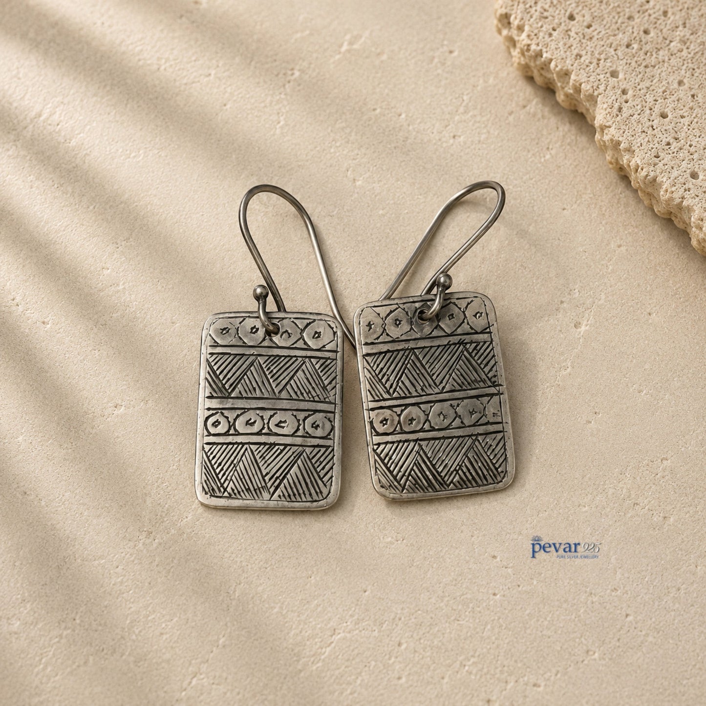 pevar925 oxidized 925 silver hook earrings featuring a geometric square design with intricate etched patterns.
