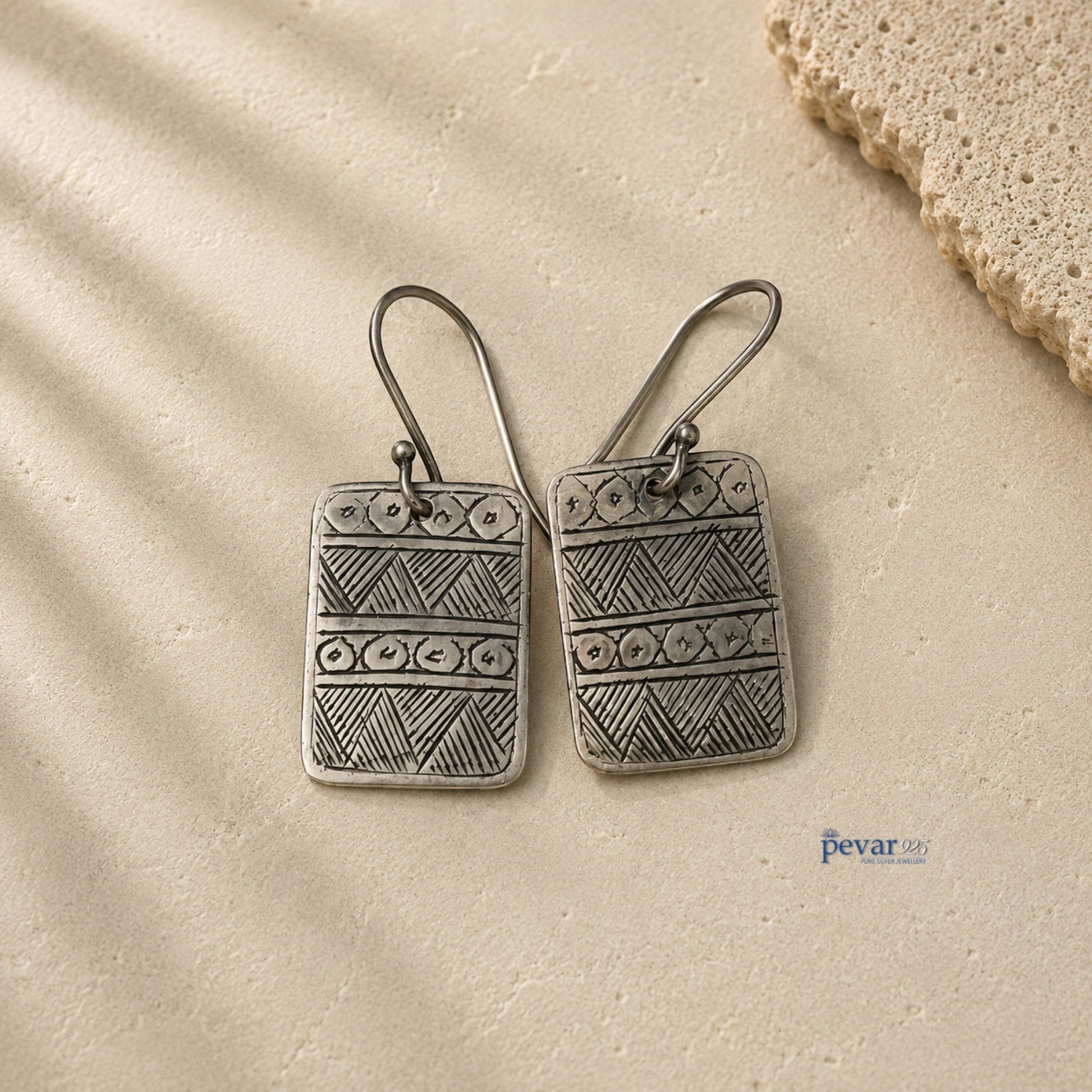 pevar925 oxidized 925 silver hook earrings featuring a geometric square design with intricate etched patterns.