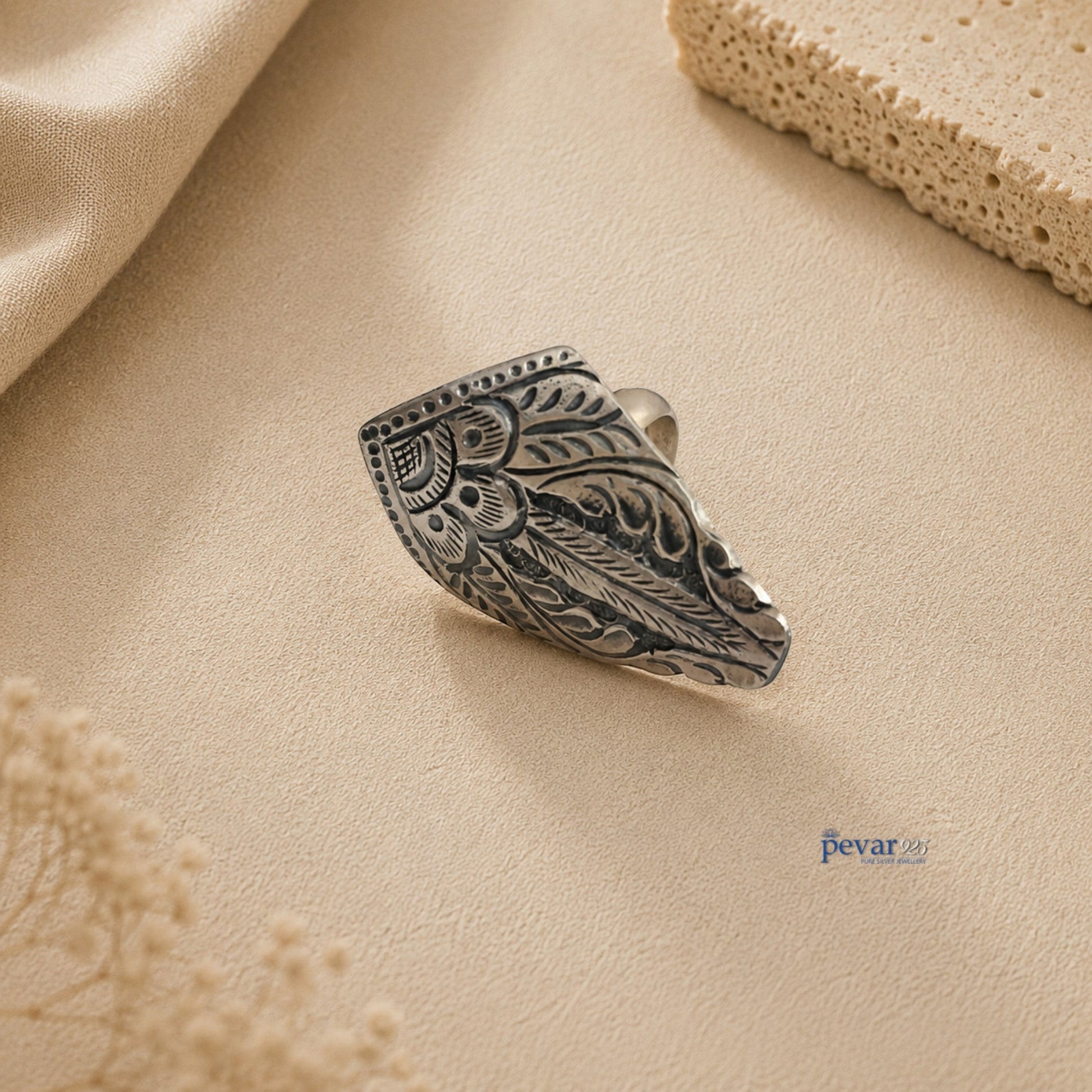 pevar925 oxidized silver adjustable ring featuring intricate floral chitai engraving in a tower motif design.