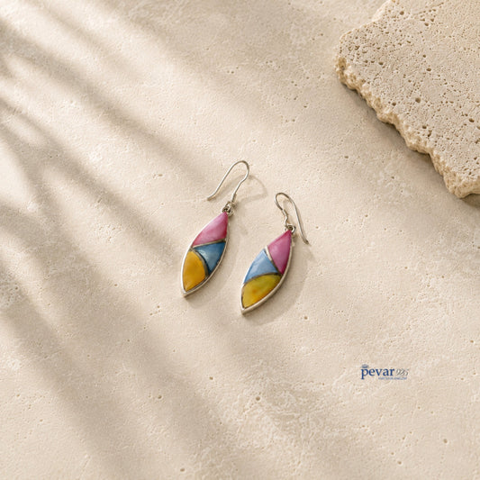 pevar925 oxidized silver hook earrings featuring tri-color leaf motifs in pink, blue, and yellow on a stone surface