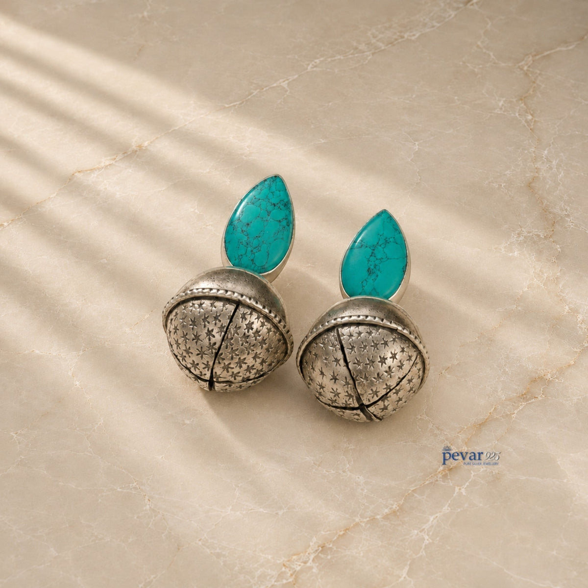 pevar925 oxidized 925 silver bell earrings featuring teardrop turquoise stones and intricate star engravings