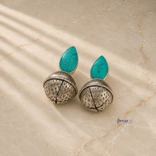 pevar925 oxidized 925 silver bell earrings featuring teardrop turquoise stones and intricate star engravings