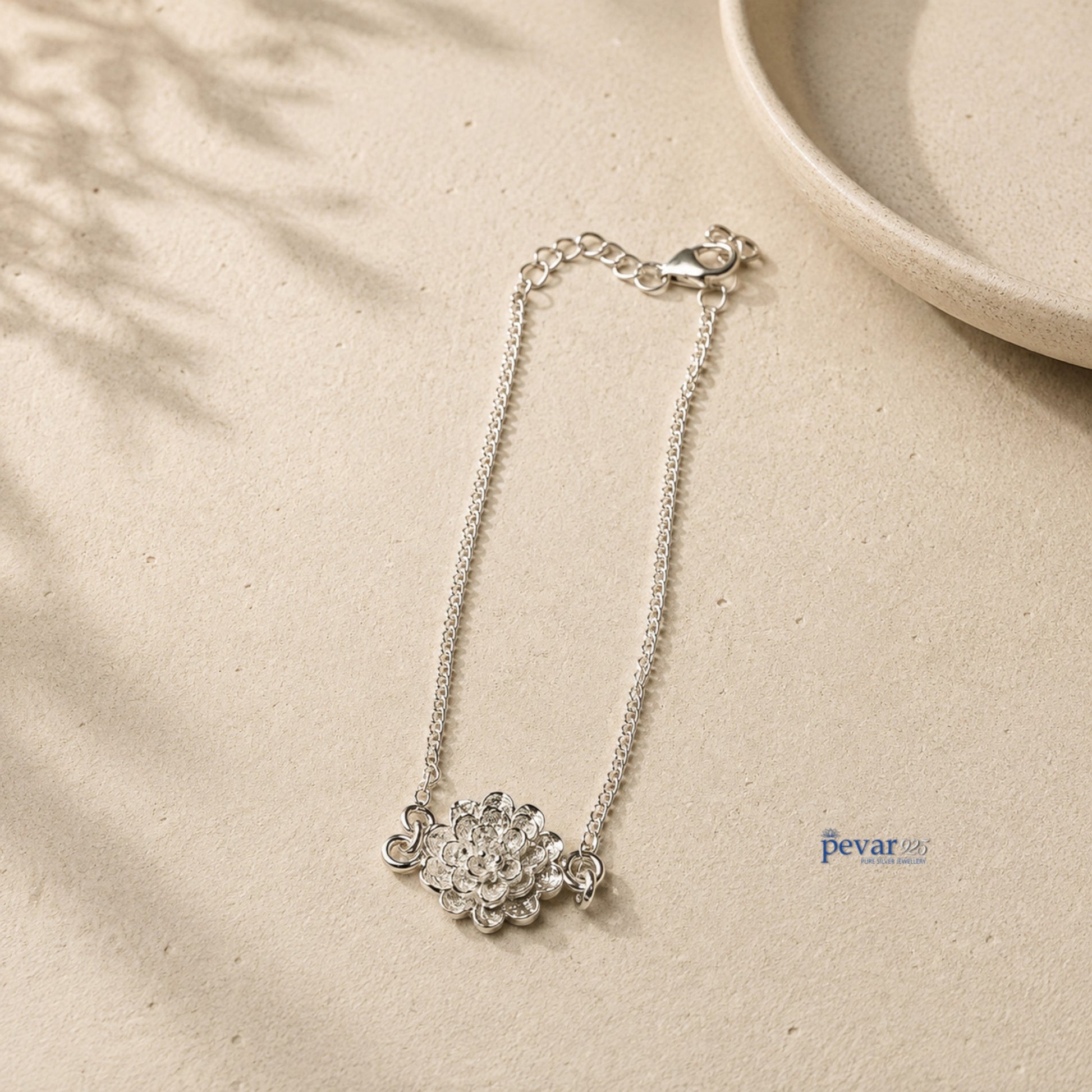 pevar925 sterling silver bracelet featuring a delicate layered blossom flower charm on a fine adjustable chain
