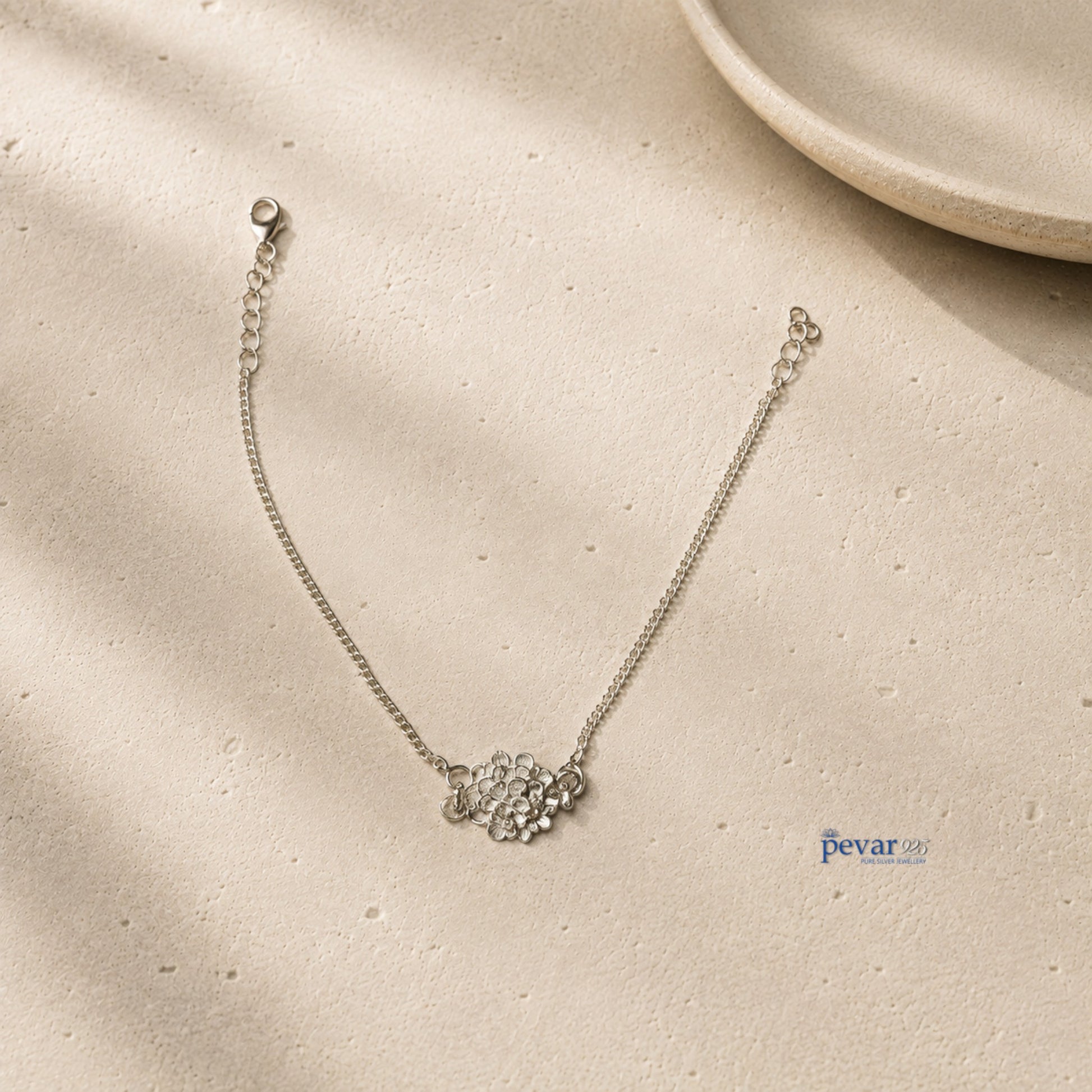 pevar925 sterling silver bracelet featuring a delicate layered blossom flower charm on a fine adjustable chain