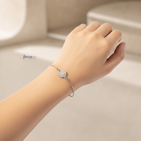 pevar925 sterling silver radiant blossom bracelet with a delicate flower charm on a woman's wrist