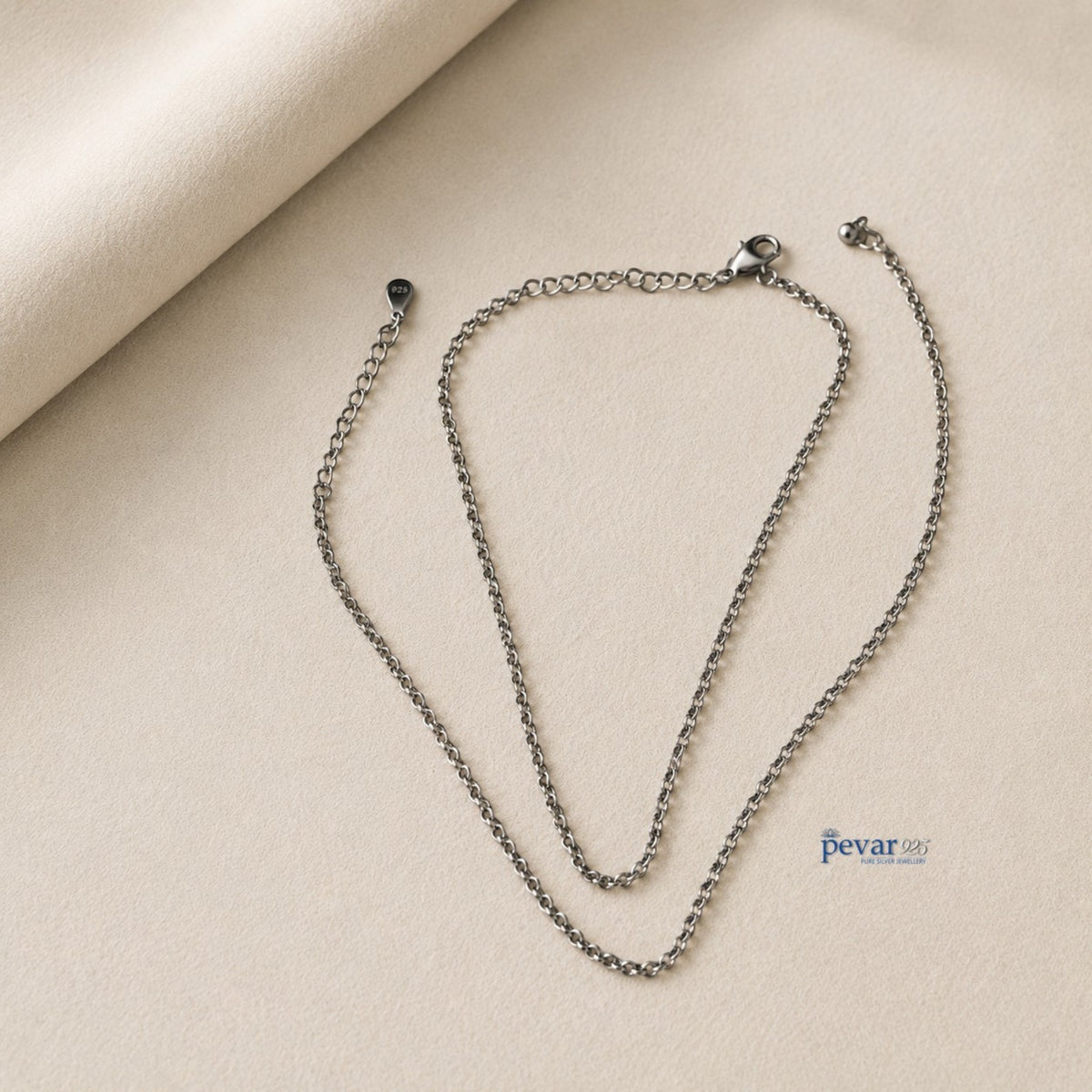 pevar925 sterling silver classic chain anklet set with lobster clasp and adjustable extension on beige fabric