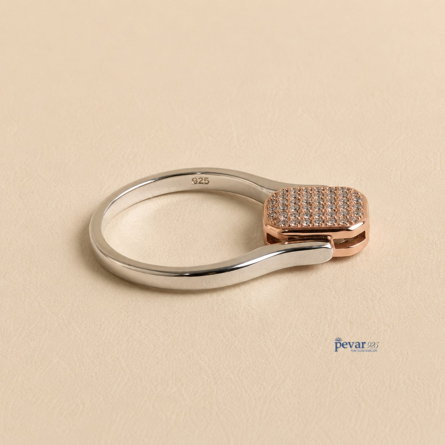 pevar925 sterling silver flip ring with a rectangular dual-tone top featuring zircon accents on a beige background