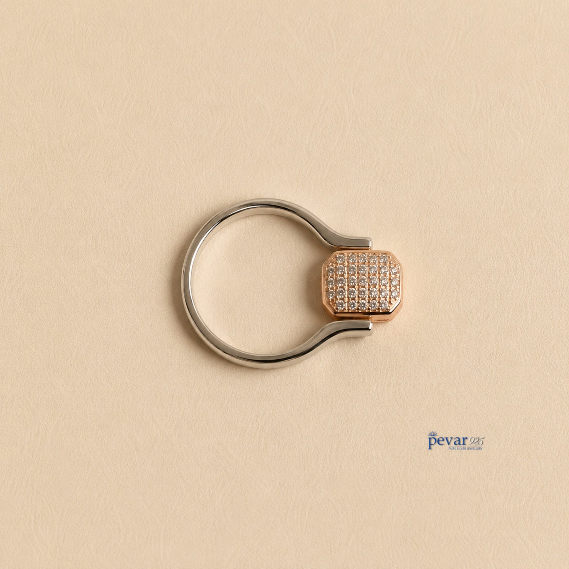 pevar925 sterling silver flip ring with a rectangular head featuring sparkling zircon accents on a neutral background