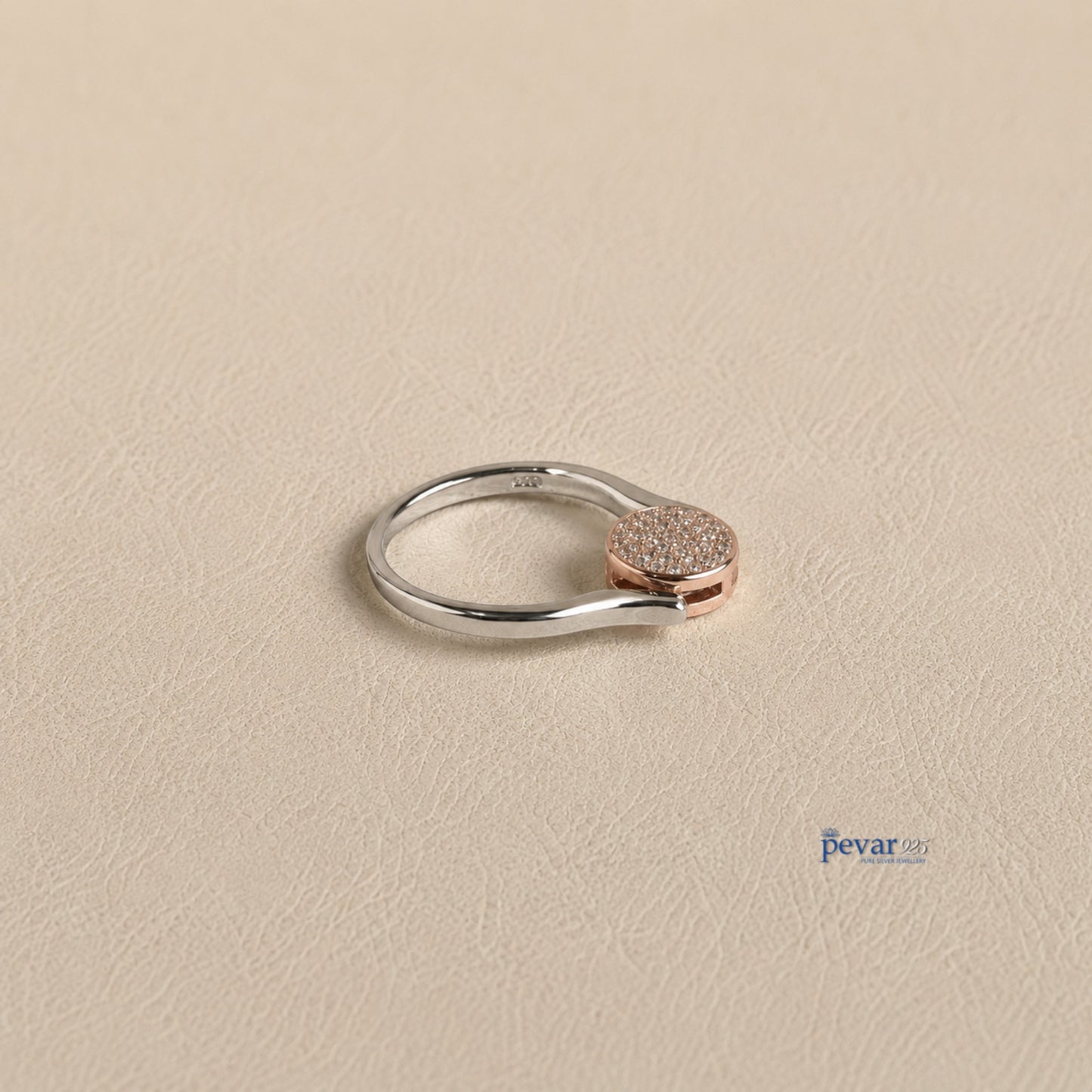 pevar925 sterling silver dual tone flip ring with a circular top featuring sparkling zircon stones