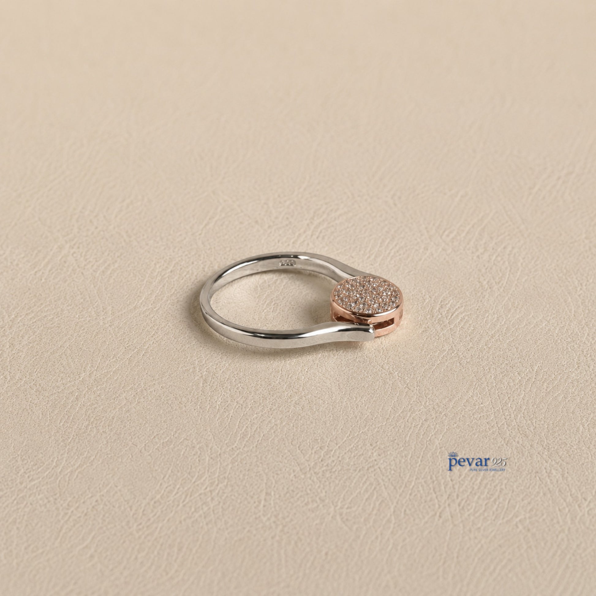 pevar925 sterling silver dual tone flip ring with a circular top featuring sparkling zircon stones
