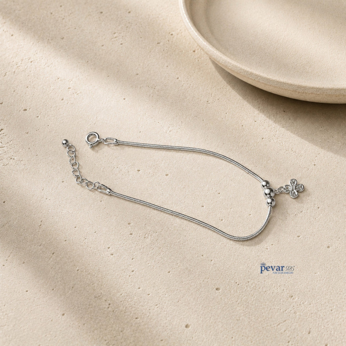 pevar925 sterling silver floral charm bracelet with a delicate chain and sparkling gemstone flower detail