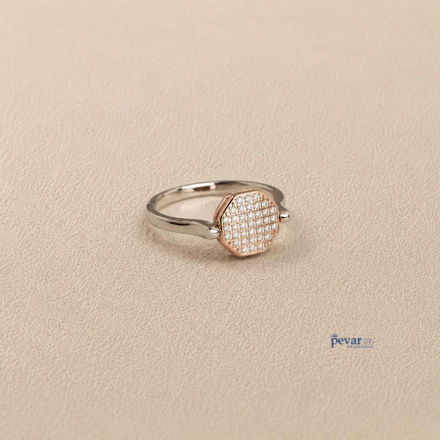 pevar925 sterling silver dual tone hexagon flip ring with zircon stones and rhodium plating on a textured surface