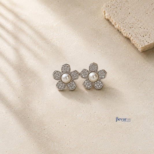 pevar925 sterling silver flower earrings featuring a central white pearl and sparkling pavé stones on a textured base